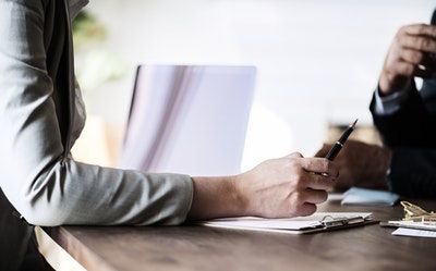 business-desk-woman-clipboard