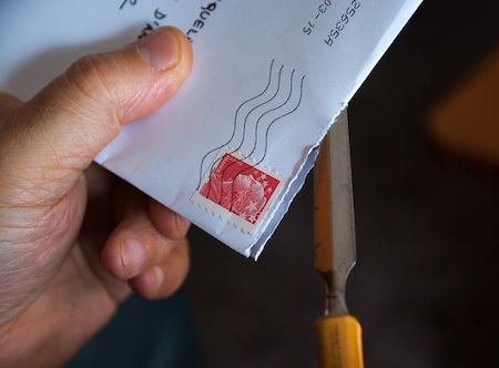 letter-stamp-opening-envelope
