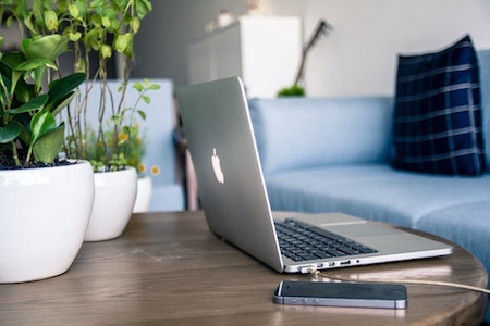 computer-phone-coffee-table-home