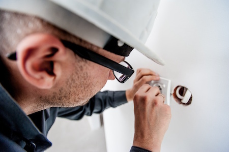 work-hand-man-electrical-repairs