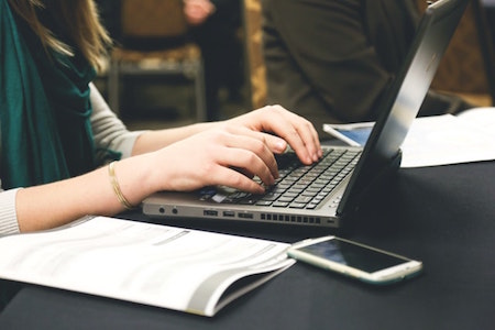 woman-typing-computer-keyboard